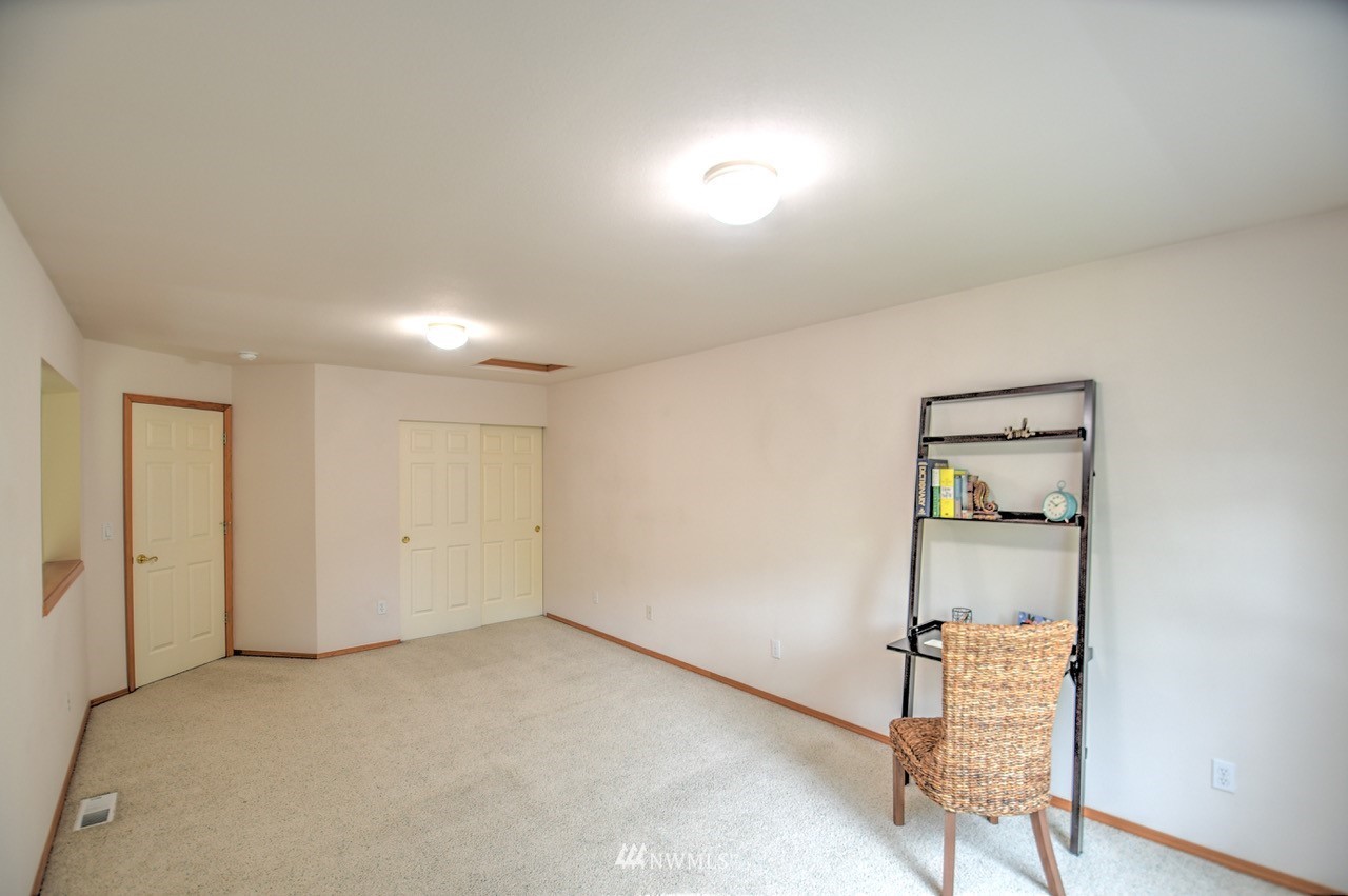 2201 192nd Street Southeast, Unit N2 Bothell, WA 98012 - Photo 29 of 39 wooden floor in an empty room