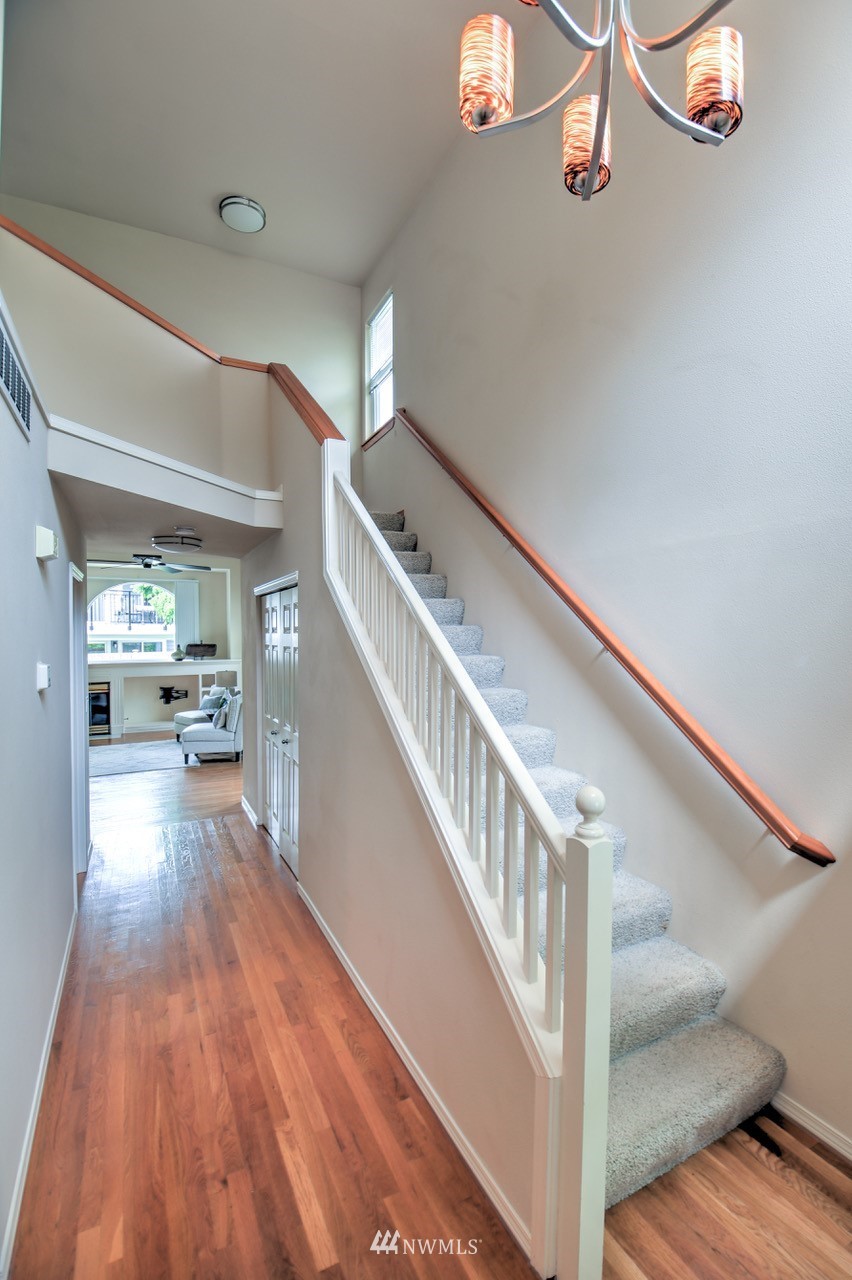 2201 192nd Street Southeast, Unit N2 Bothell, WA 98012 - Photo 3 of 39 a view of entryway and hall with wooden floor