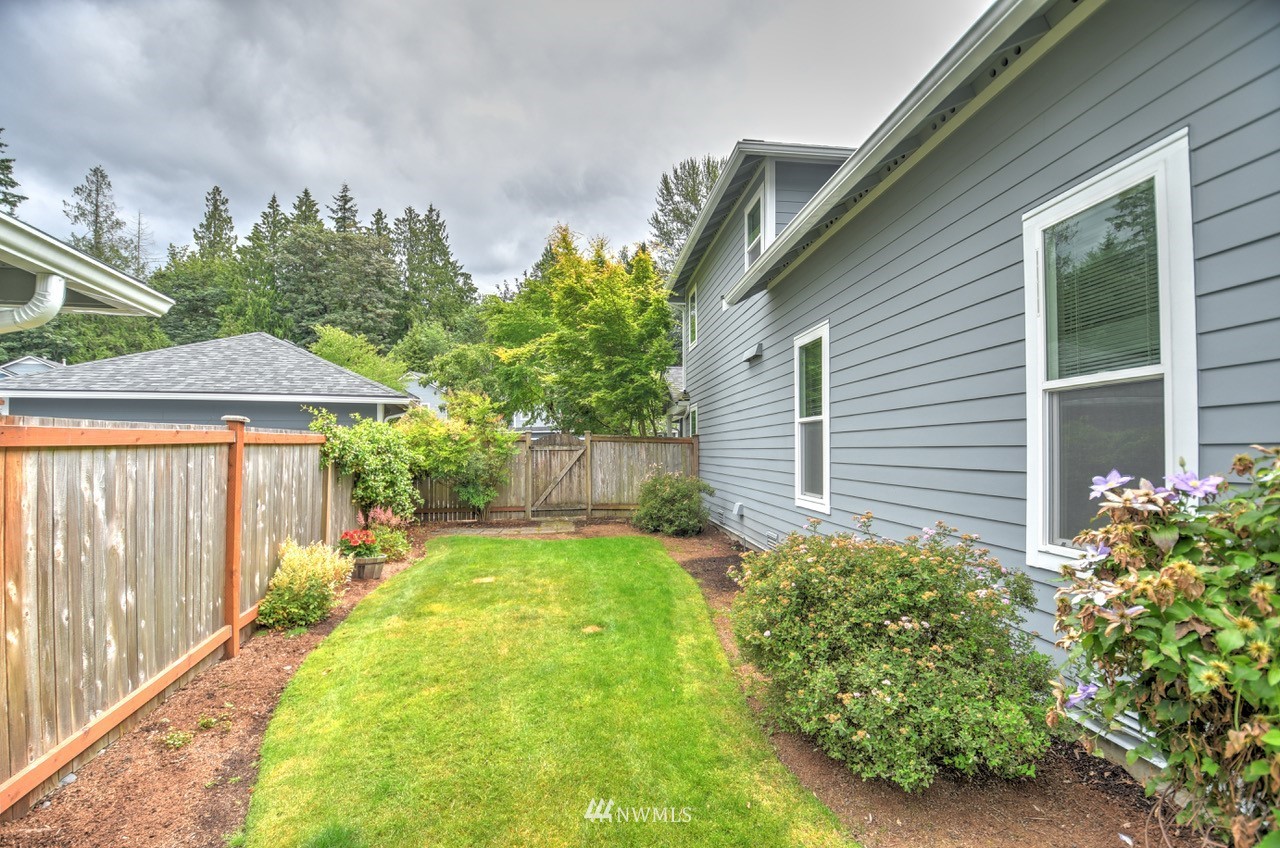 2201 192nd Street Southeast, Unit N2 Bothell, WA 98012 - Photo 38 of 39 a house view with a garden space