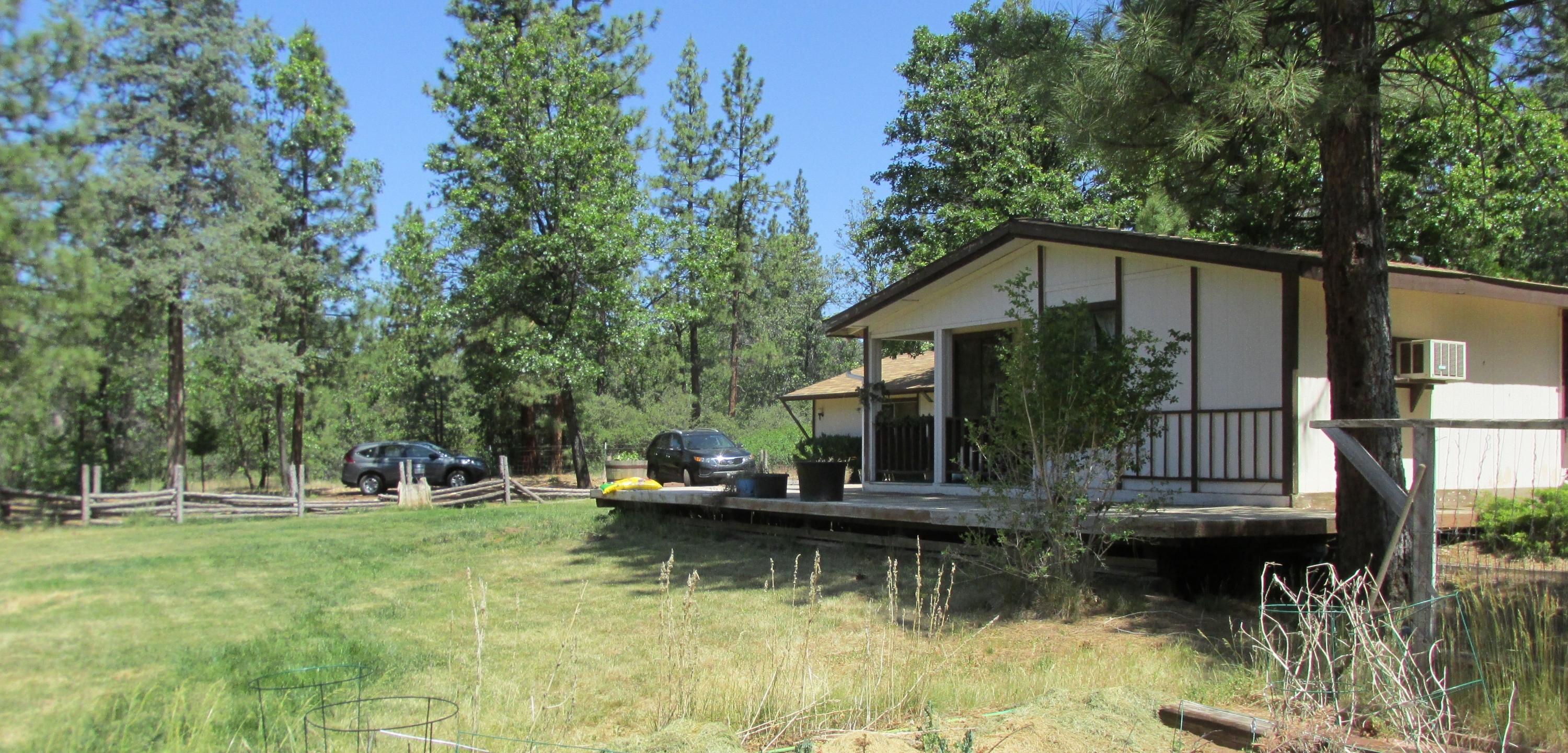 29405 Day Road McArthur, CA 96056 - Photo 1 of 45 a view of house with swimming pool and garden