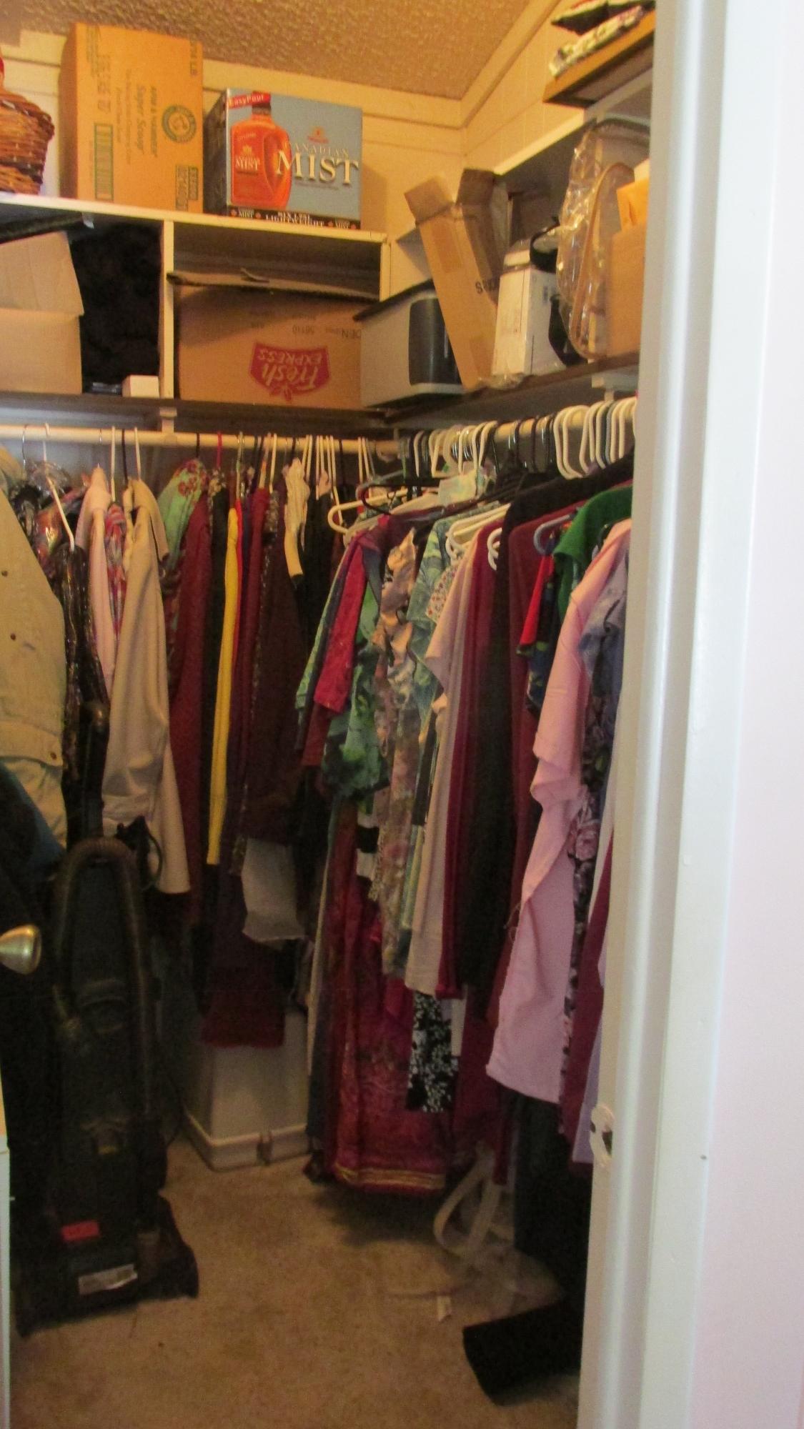 29405 Day Road McArthur, CA 96056 - Photo 16 of 45 a view of walk in closet with clothes and shoes
