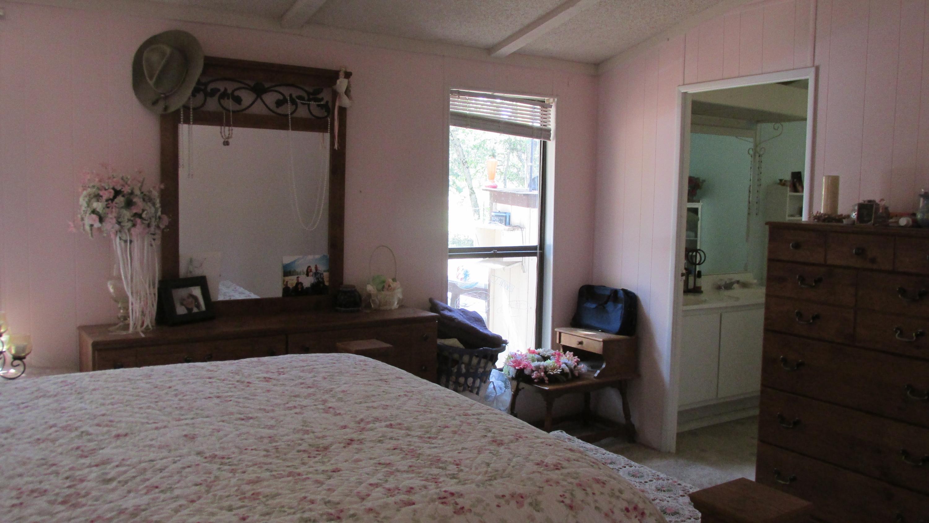 29405 Day Road McArthur, CA 96056 - Photo 18 of 45 a bedroom with a bed and a dresser
