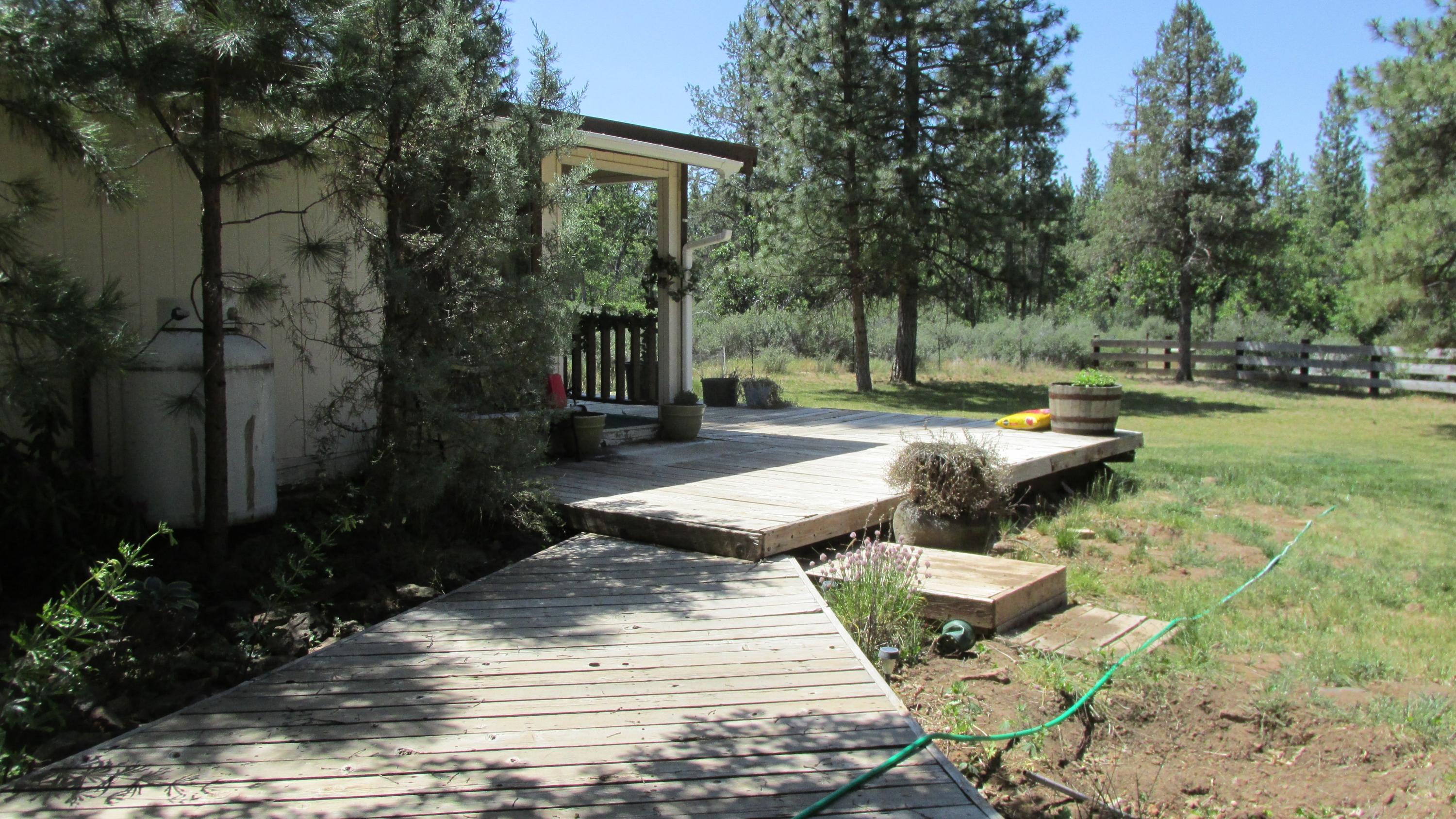 29405 Day Road McArthur, CA 96056 - Photo 24 of 45 a view of a backyard with sitting area