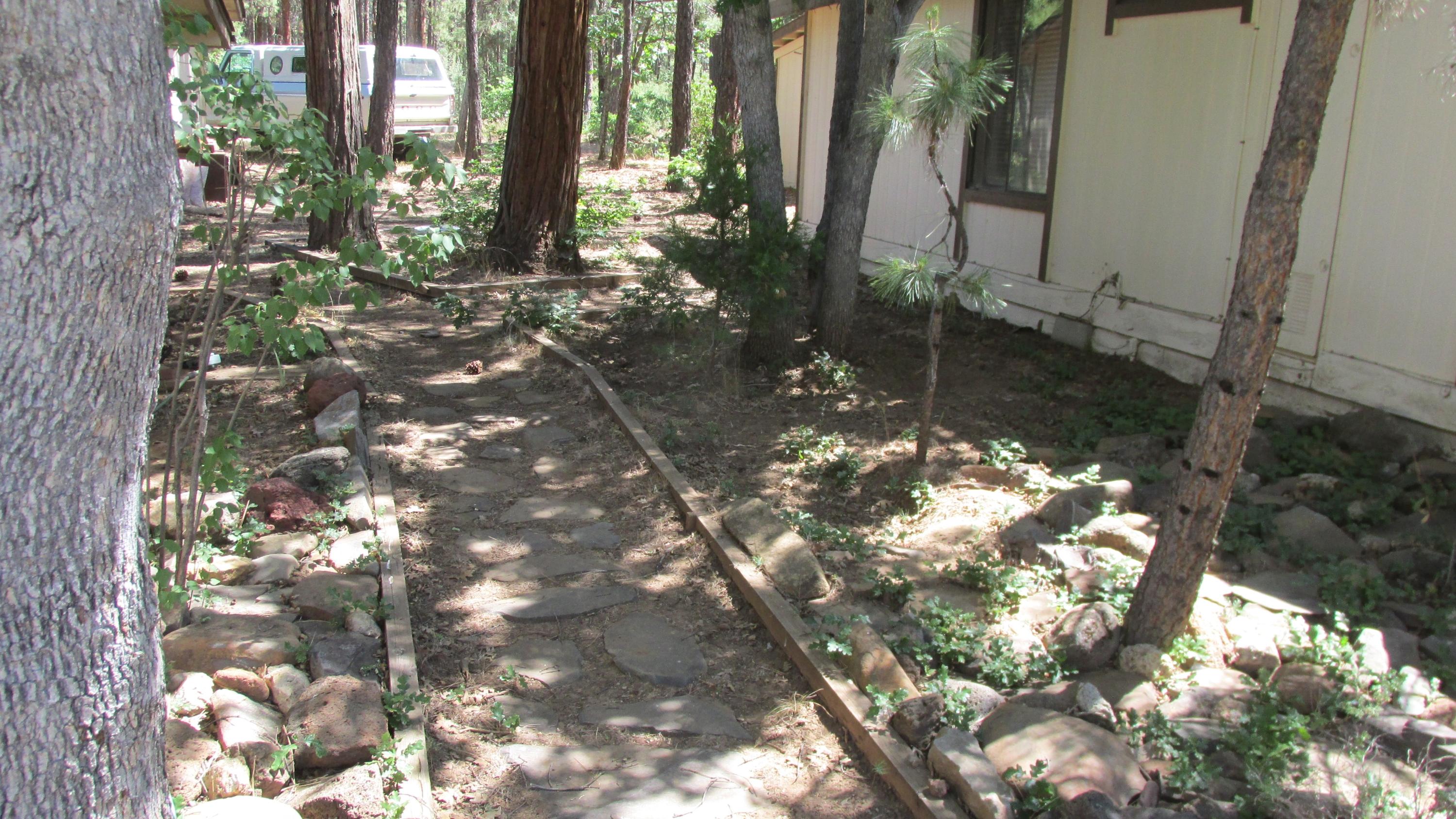 29405 Day Road McArthur, CA 96056 - Photo 26 of 45 a backyard of a house with lots of green space