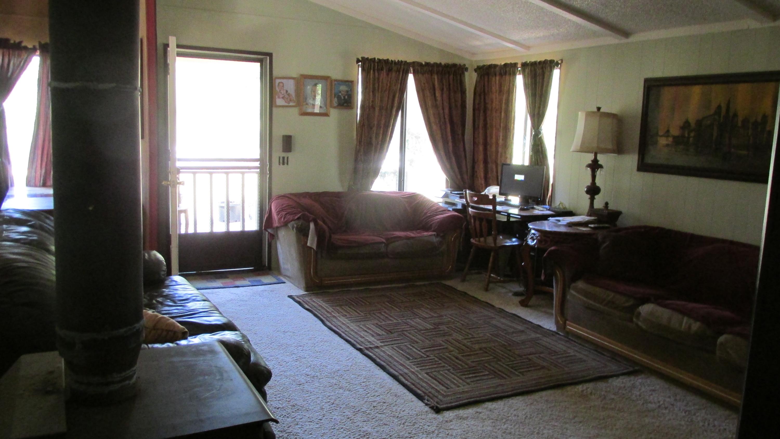 29405 Day Road McArthur, CA 96056 - Photo 6 of 45 a living room with furniture and a window