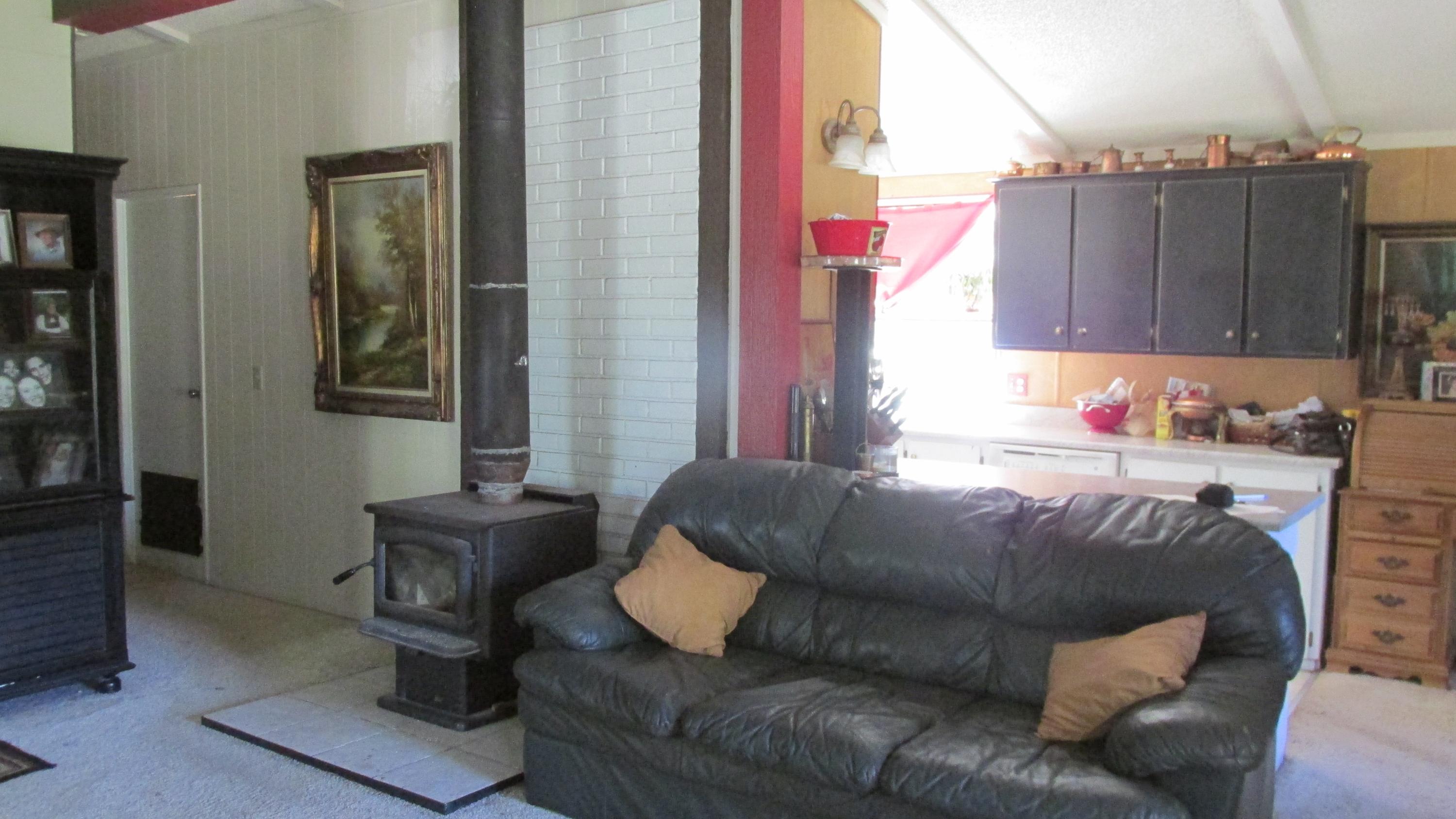29405 Day Road McArthur, CA 96056 - Photo 7 of 45 a living room with a couch and a window