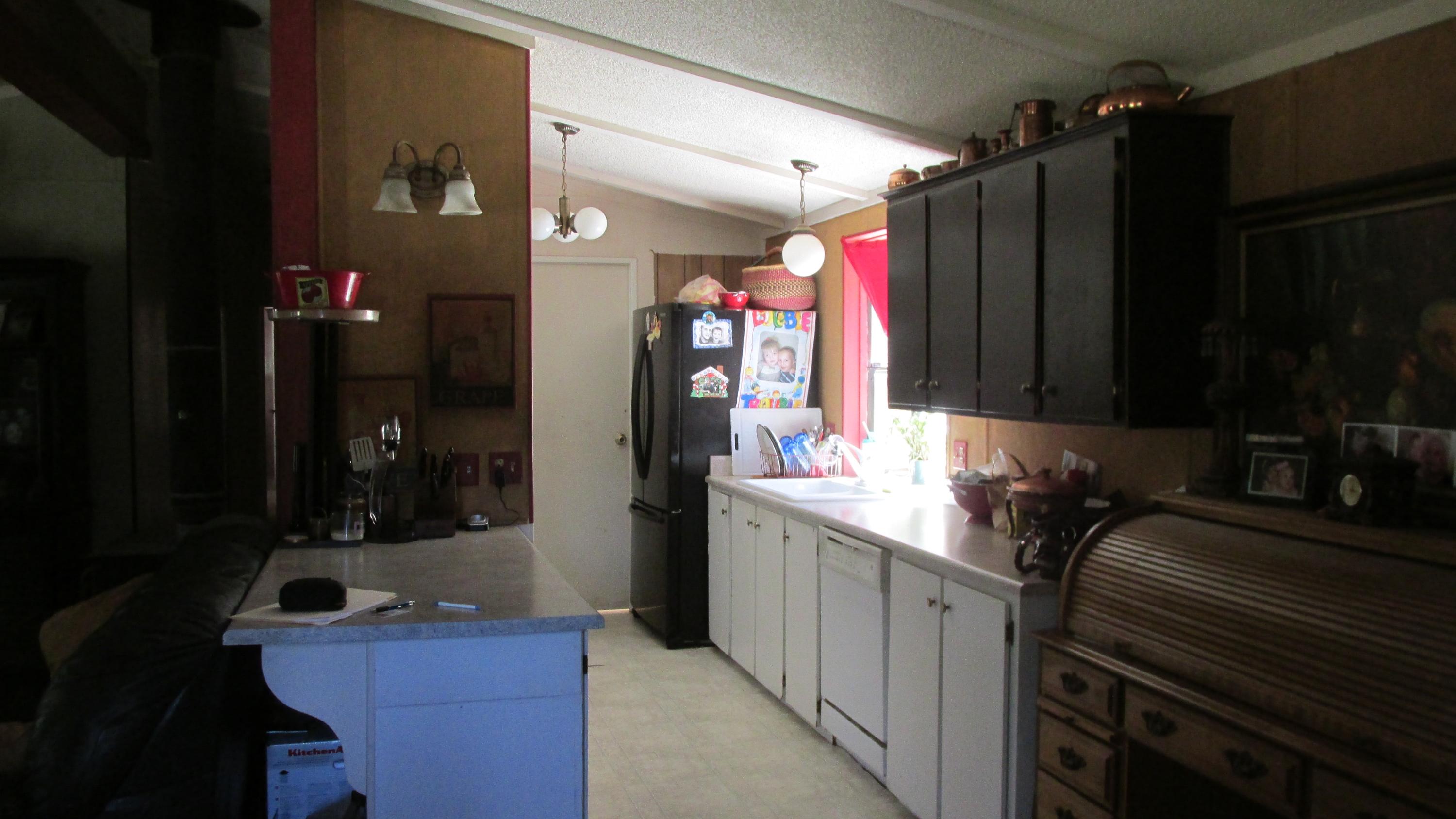 29405 Day Road McArthur, CA 96056 - Photo 8 of 45 a kitchen with a sink and cabinets