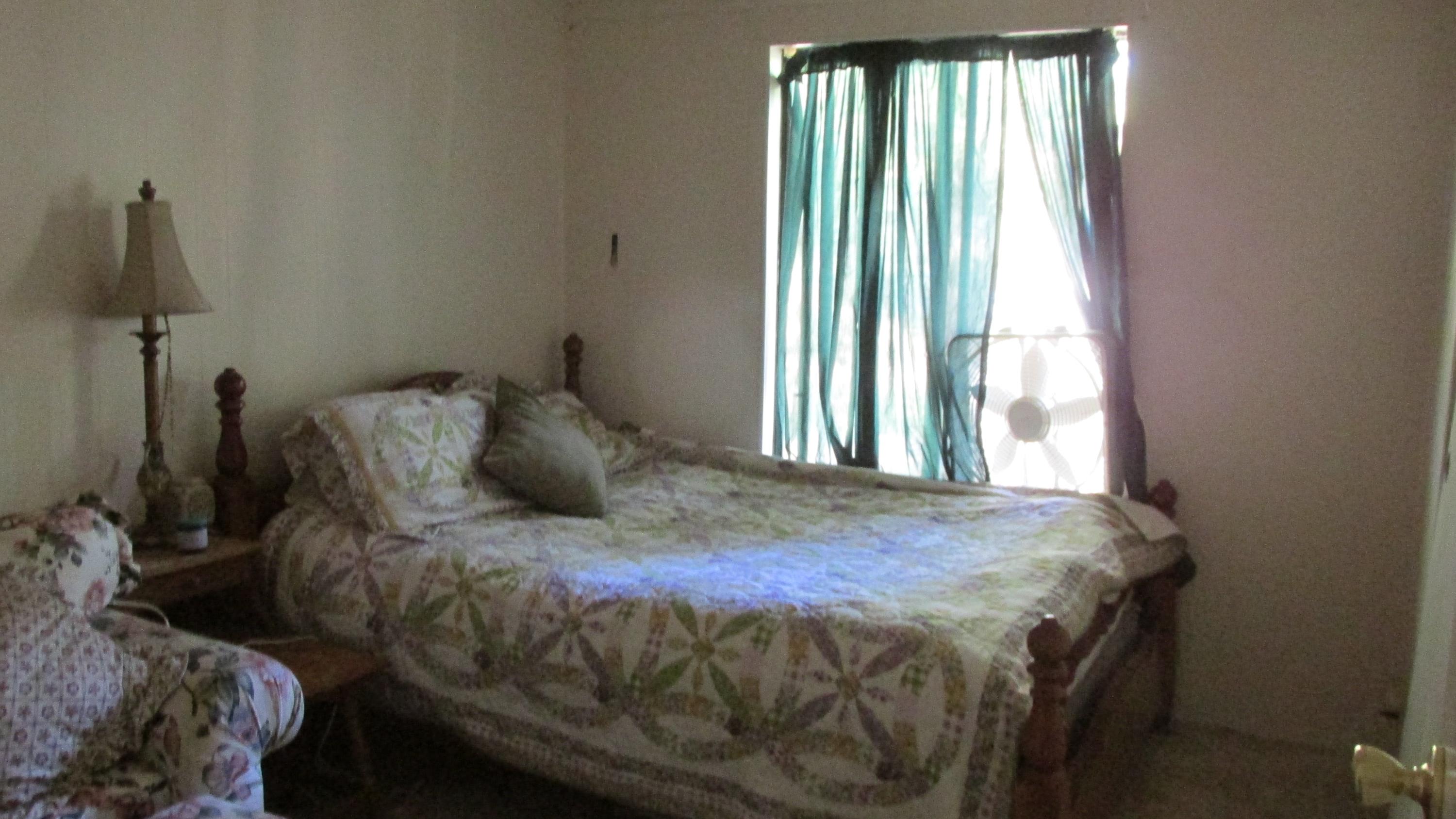 29405 Day Road McArthur, CA 96056 - Photo 10 of 45 a bedroom with a bed and a window
