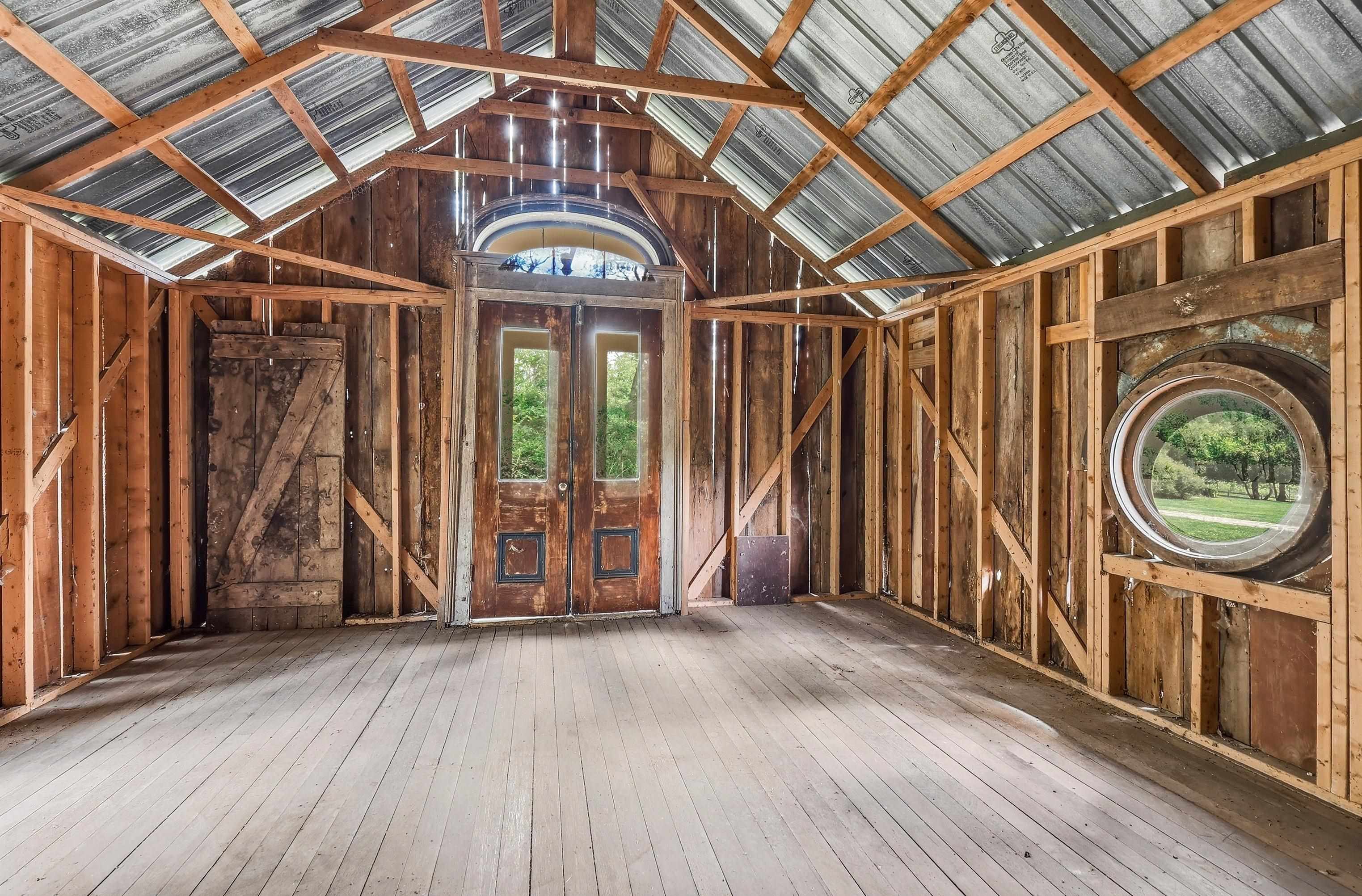 2562 West Blackjack Road Galena, IL 61036 - Photo 56 of 75 a view of a room with wooden floor and windows