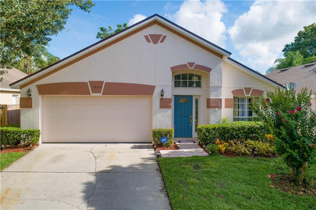1902 Needham Road Apopka, FL 32712 - Photo 1 of 1 a view of backyard of house and outdoor seating