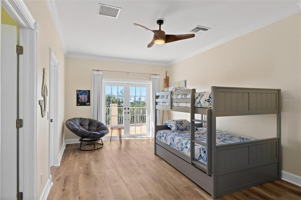 63 Palm Drive Placida, FL 33946 - Photo 20 of 54 a bedroom with furniture and a window