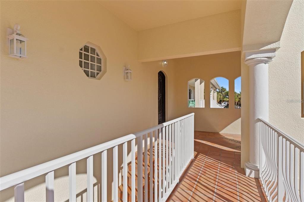 63 Palm Drive Placida, FL 33946 - Photo 36 of 54 a view of a hallway with windows