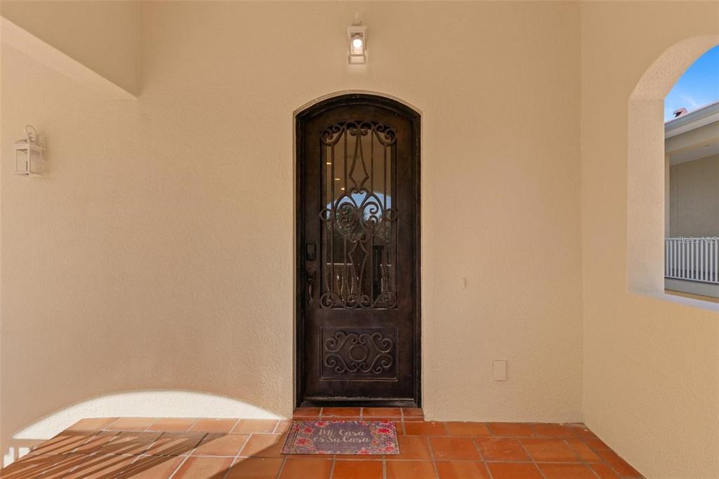 63 Palm Drive Placida, FL 33946 - Photo 4 of 54 a view of a hallway with wooden floor and a bathroom
