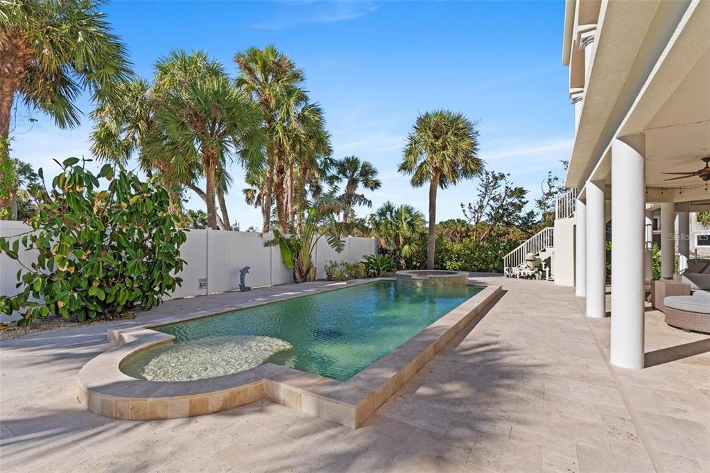 63 Palm Drive Placida, FL 33946 - Photo 41 of 54 a view of a swimming pool with a backyard