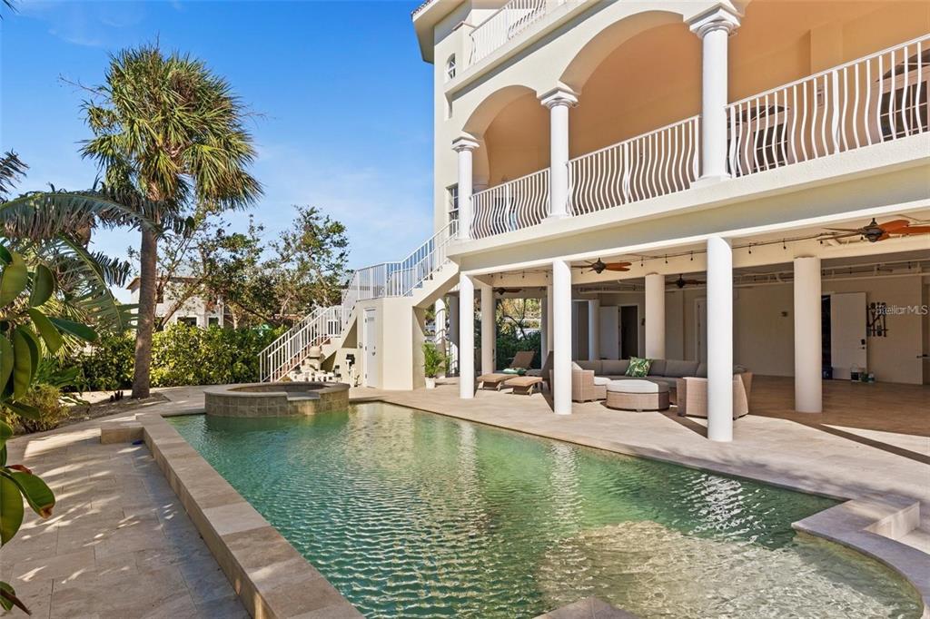 63 Palm Drive Placida, FL 33946 - Photo 42 of 54 swimming pool with outdoor seating