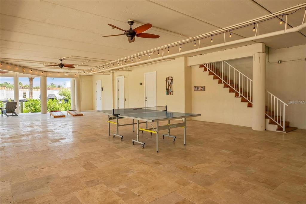 63 Palm Drive Placida, FL 33946 - Photo 43 of 54 a view of a livingroom with furniture and a ceiling fan