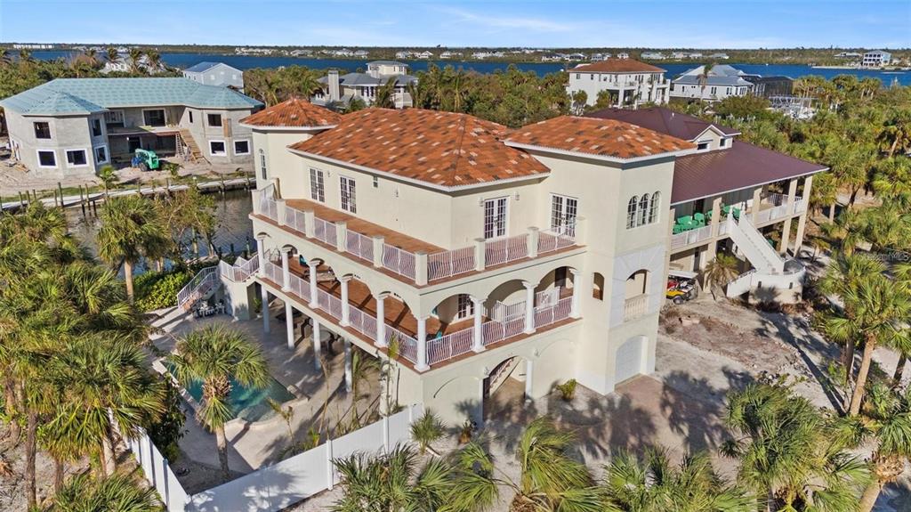 63 Palm Drive Placida, FL 33946 - Photo 50 of 54 an aerial view of a house with a big yard