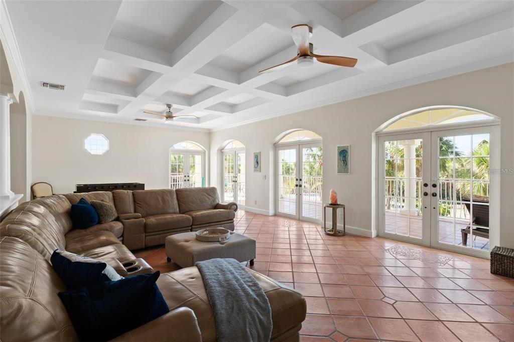 63 Palm Drive Placida, FL 33946 - Photo 9 of 54 a living room with furniture and a large window