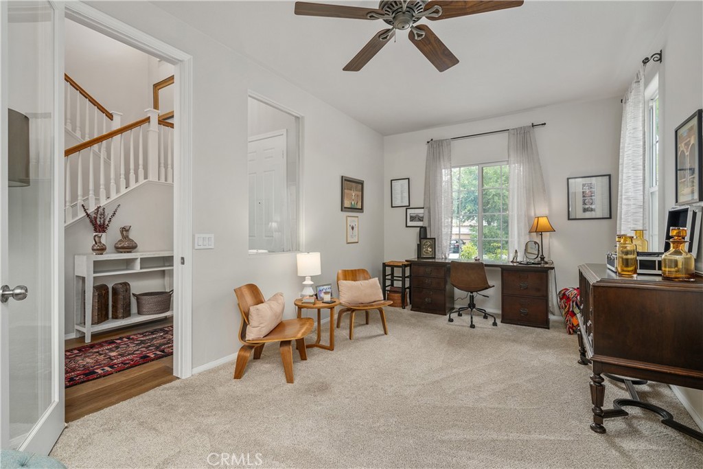 25730 Hawthorne Place Stevenson Ranch, CA 91381 - Photo 7 of 41 a view of a livingroom with furniture and windows
