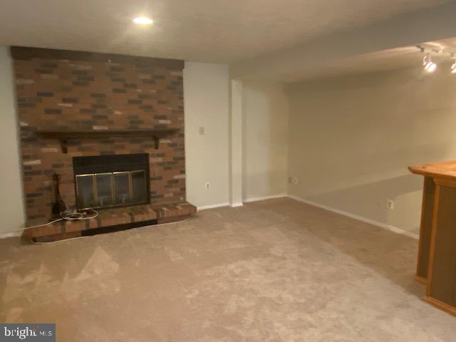 1409 Silo Way Silver Spring, MD 20905 - Photo 32 of 43 Basement Family Room With Woof Fireplace and Blow