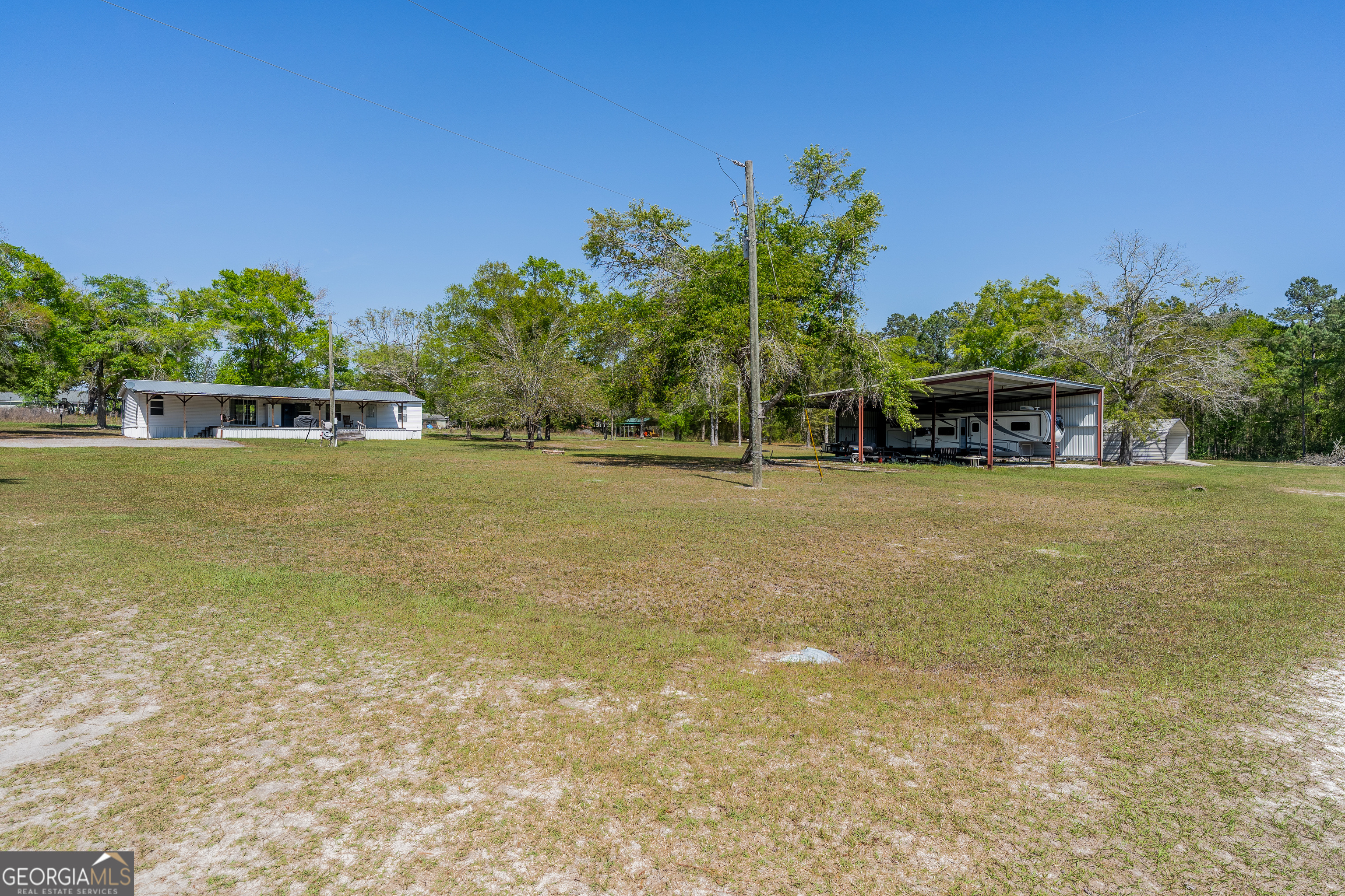 3642 Tanner Lane Waycross, GA 31503 - Photo 11 of 36 a view of a lake with houses