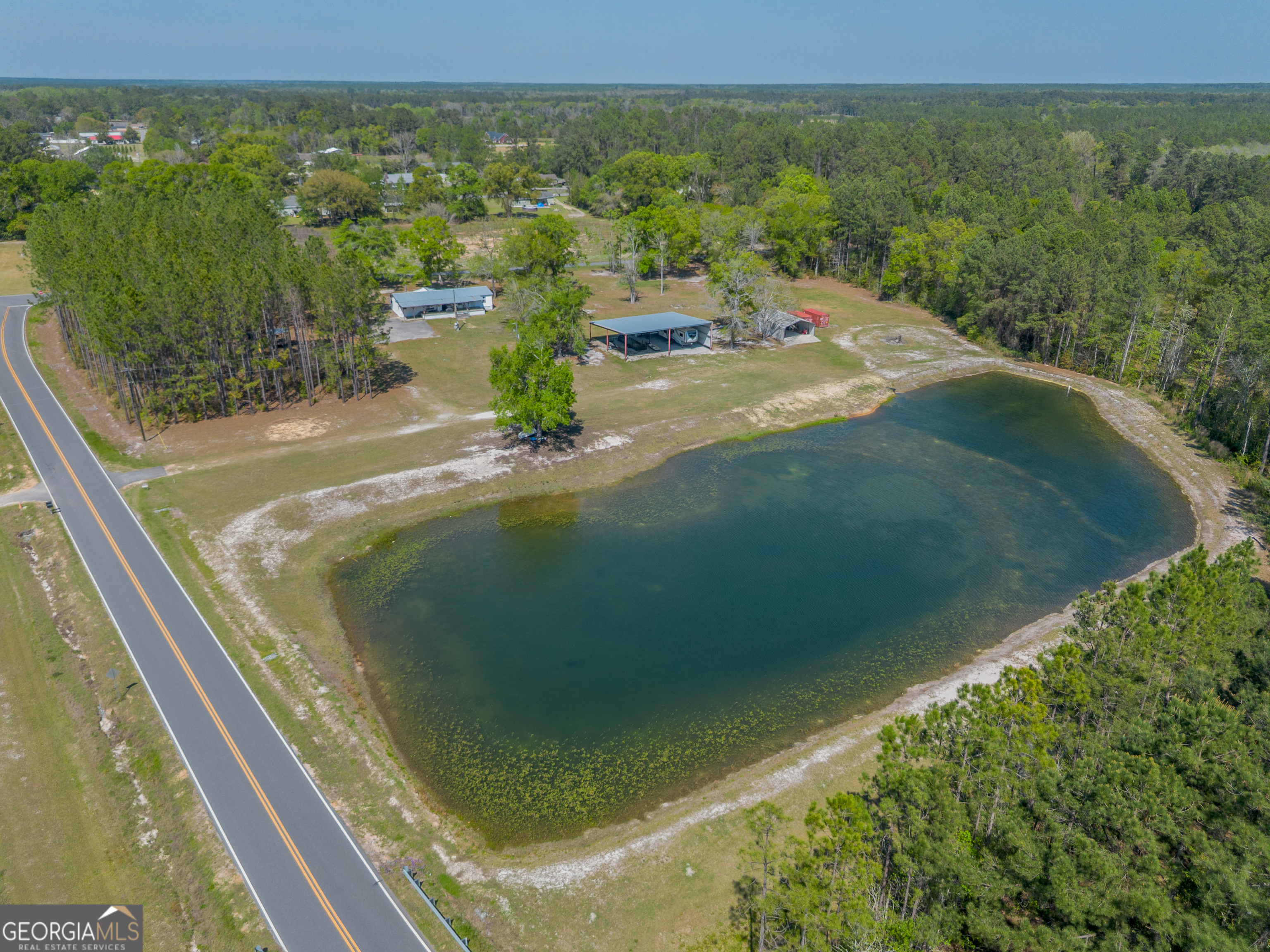 3642 Tanner Lane Waycross, GA 31503 - Photo 18 of 36 a view of a lake from a window