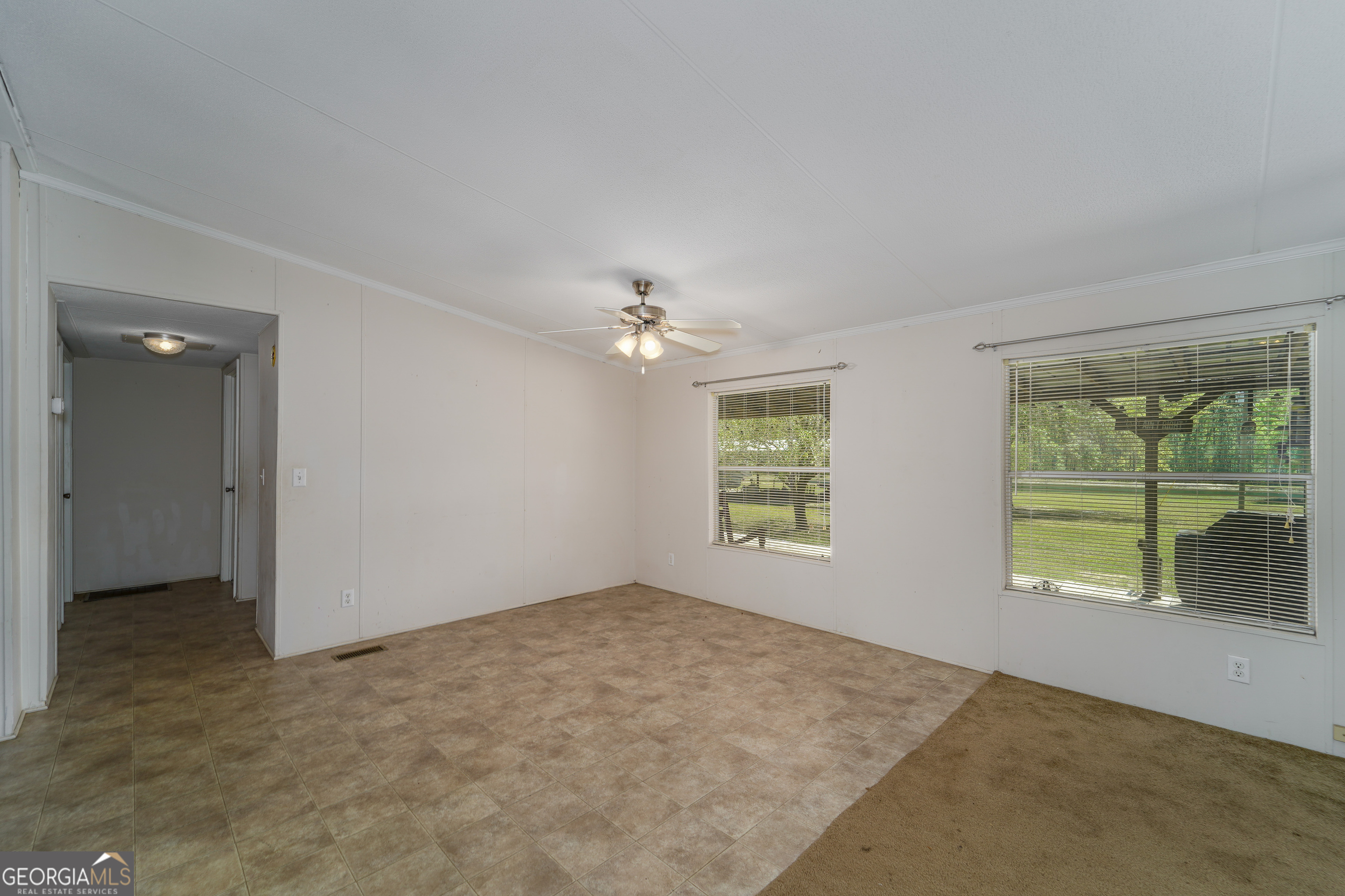 3642 Tanner Lane Waycross, GA 31503 - Photo 25 of 36 an empty room with windows and closet