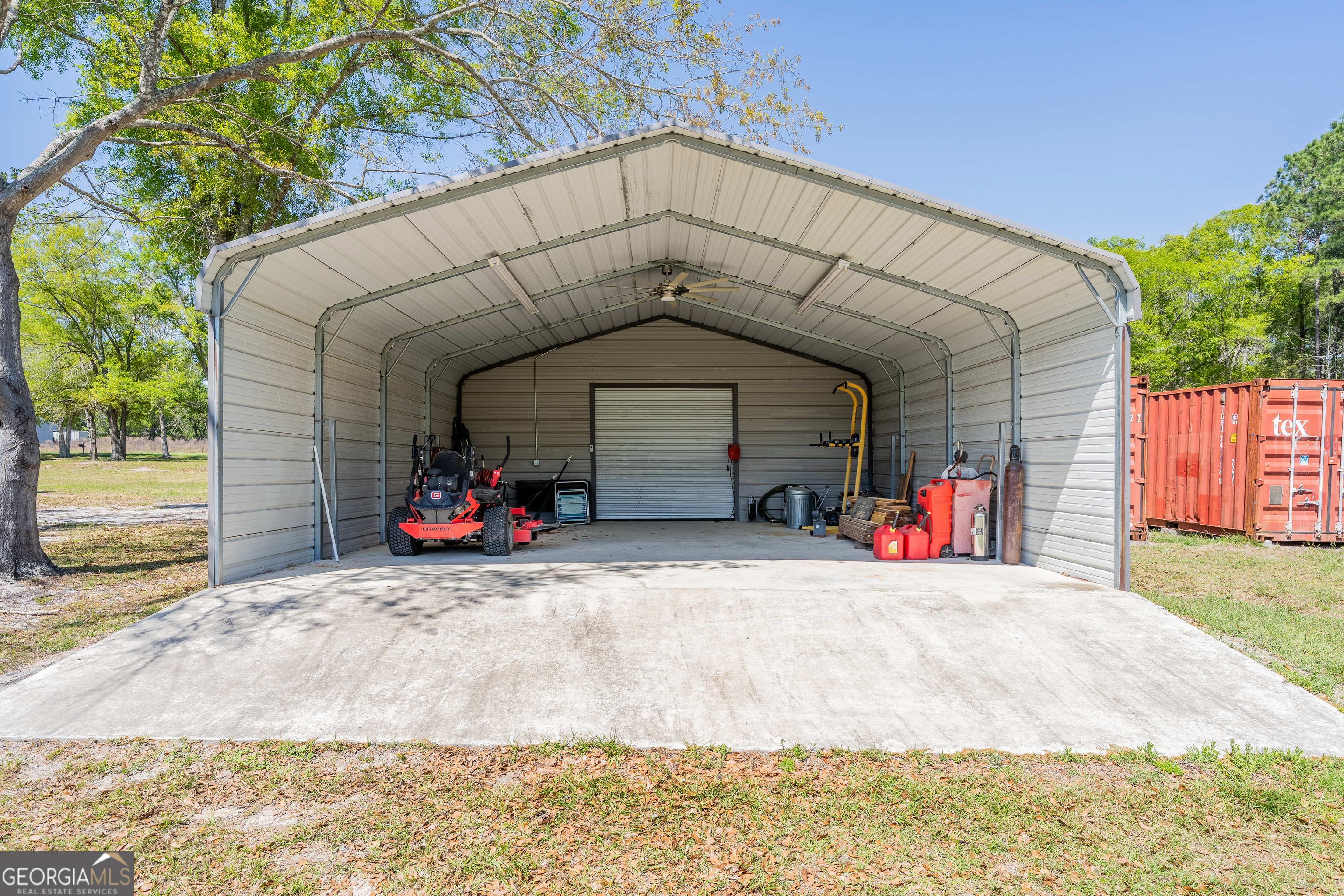 3642 Tanner Lane Waycross, GA 31503 - Photo 6 of 36 a view of a house with a small yard and a large tree