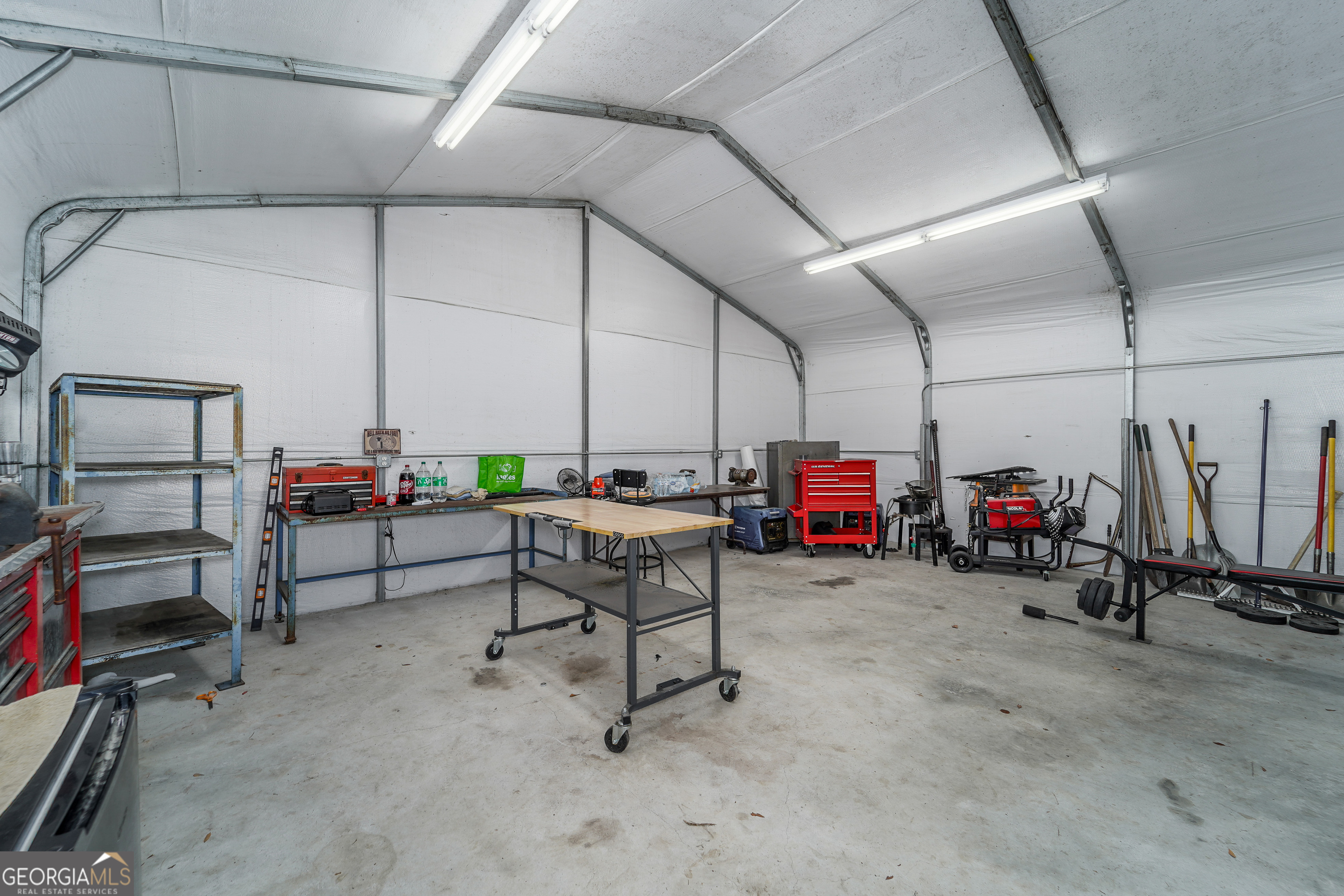 3642 Tanner Lane Waycross, GA 31503 - Photo 8 of 36 a view of a garage with tv