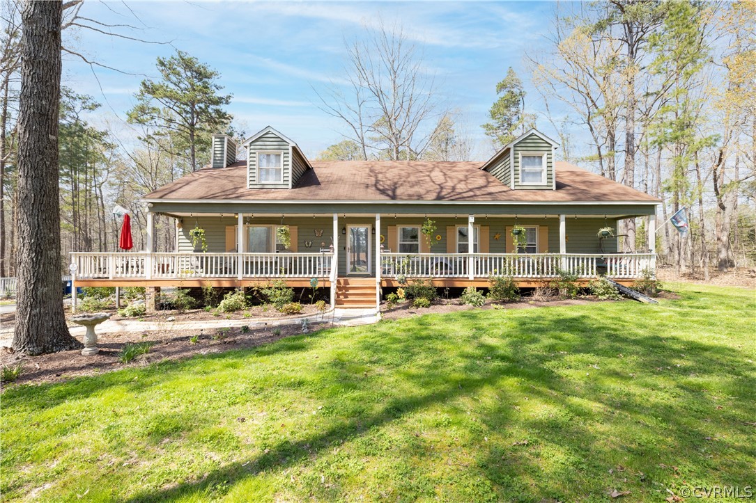18920 Duval Road Moseley, VA 23120 - Photo 2 of 31 a view of a house with pool and chairs