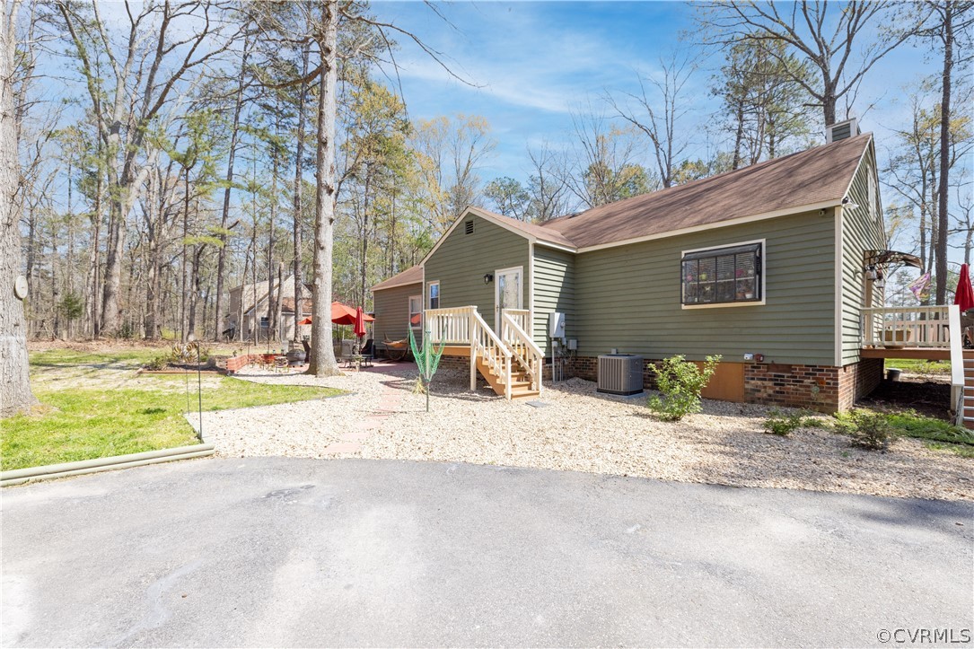 18920 Duval Road Moseley, VA 23120 - Photo 26 of 31 a view of a house with a patio