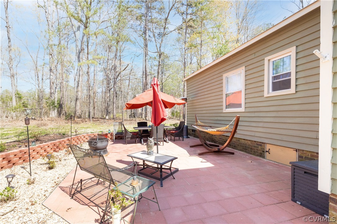 18920 Duval Road Moseley, VA 23120 - Photo 27 of 31 a building outdoor space with patio furniture