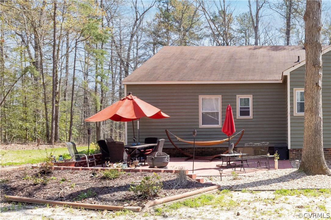 18920 Duval Road Moseley, VA 23120 - Photo 29 of 31 a front view of house with yard and seating area