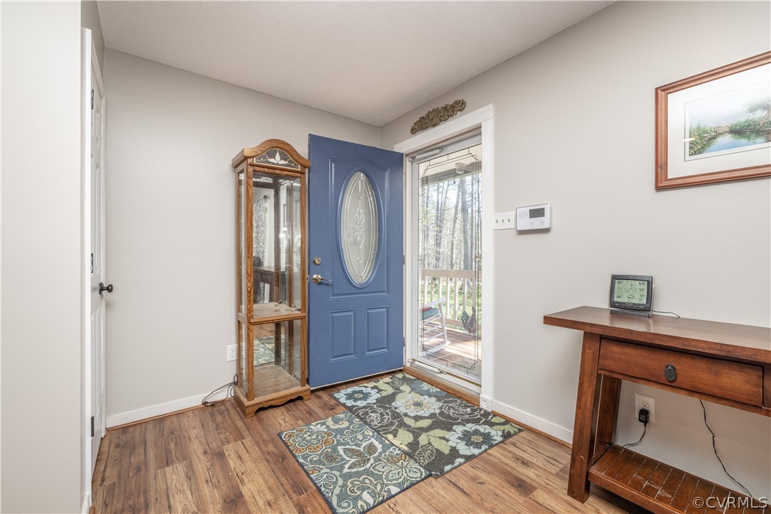 18920 Duval Road Moseley, VA 23120 - Photo 6 of 31 a view of an entryway with wooden floor