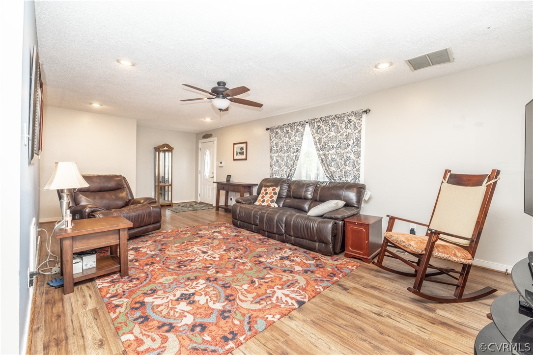 18920 Duval Road Moseley, VA 23120 - Photo 8 of 31 a living room with furniture and a rug