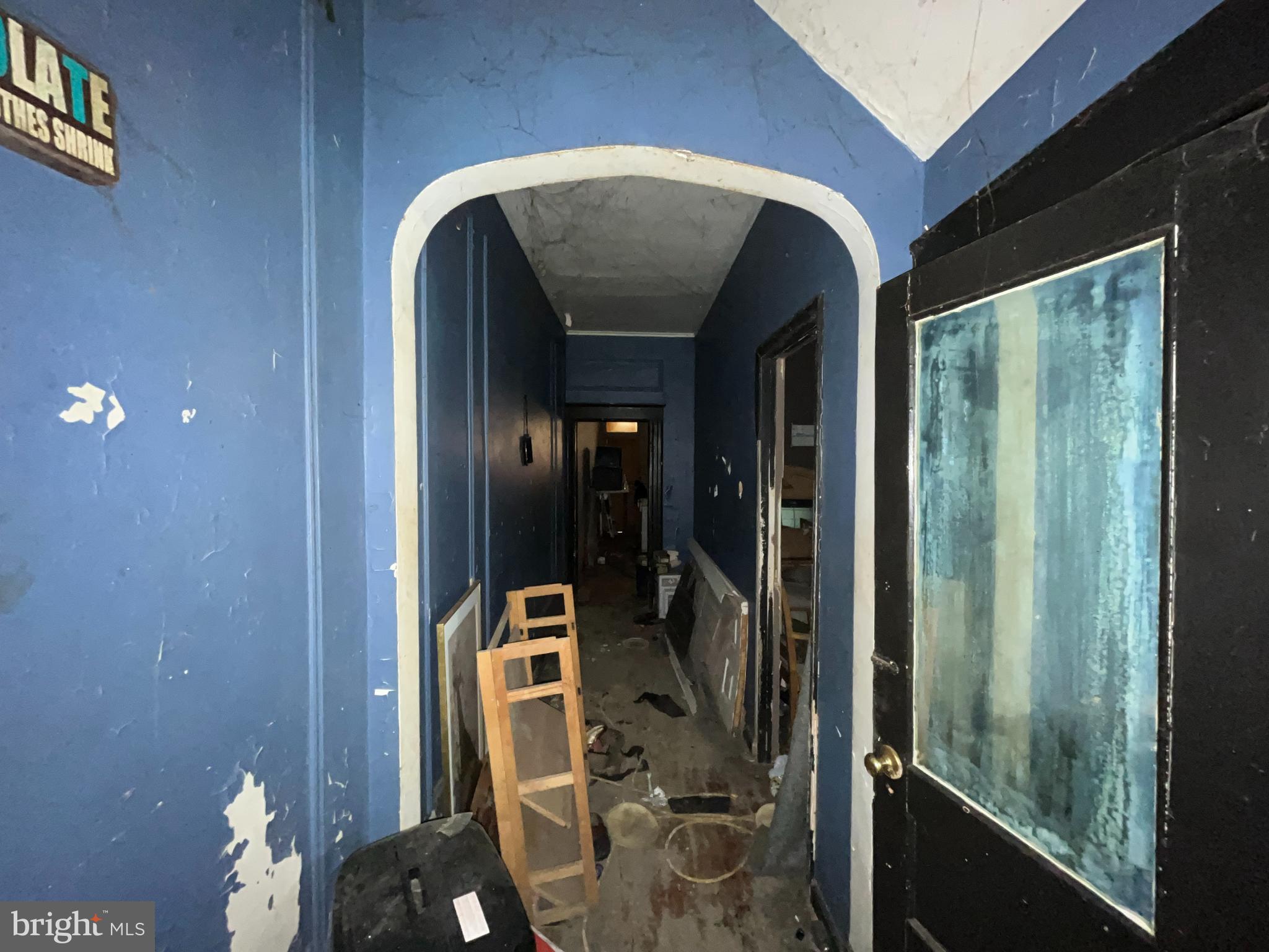 2807 Winchester Street Baltimore, MD 21216 - Photo 6 of 16 a view of entryway and hall with wooden floor