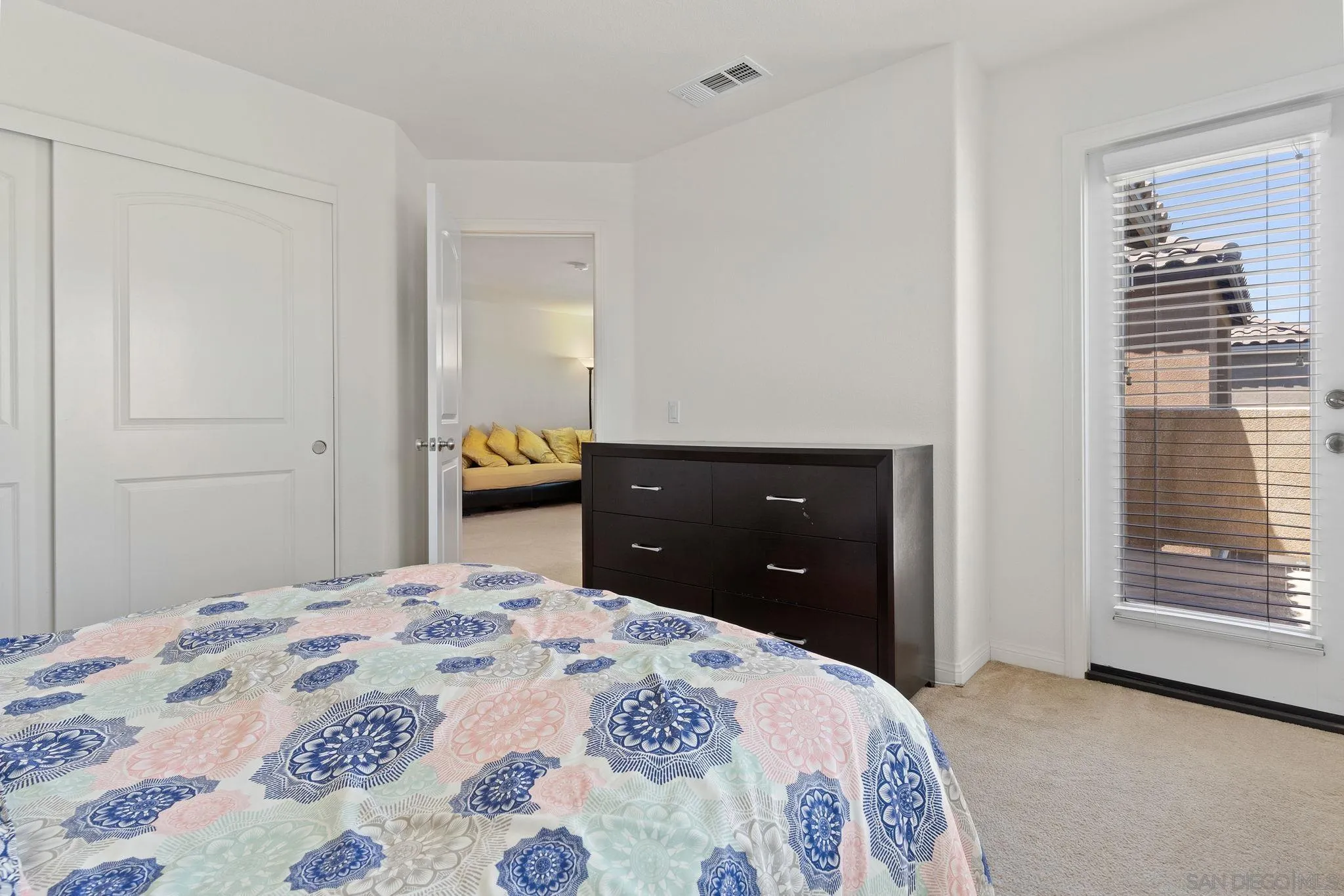 1438 Pershing Road Chula Vista, CA 91913 - Photo 12 of 45 a bedroom with a bed and a dresser