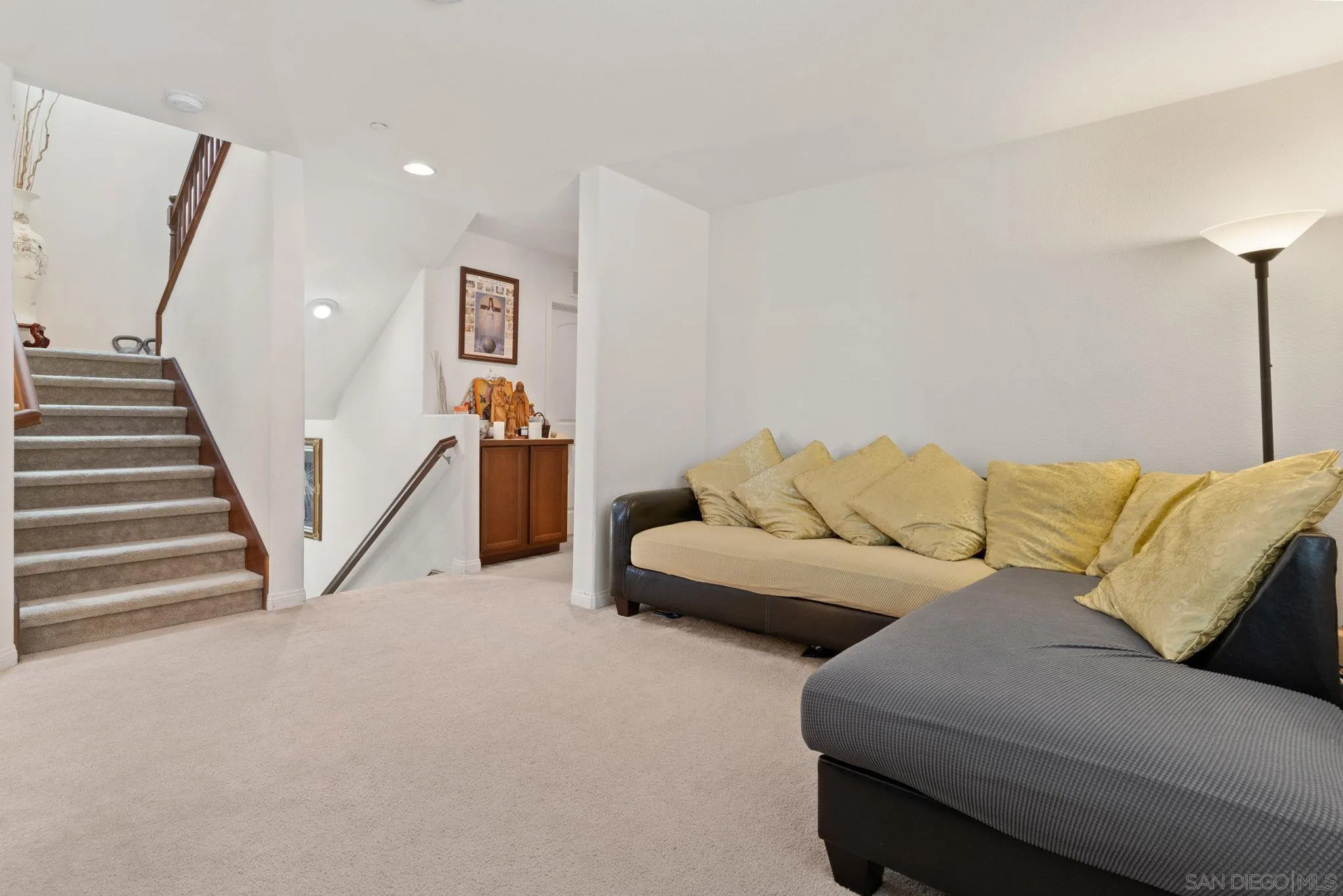 1438 Pershing Road Chula Vista, CA 91913 - Photo 14 of 45 a living room with furniture and a stairs