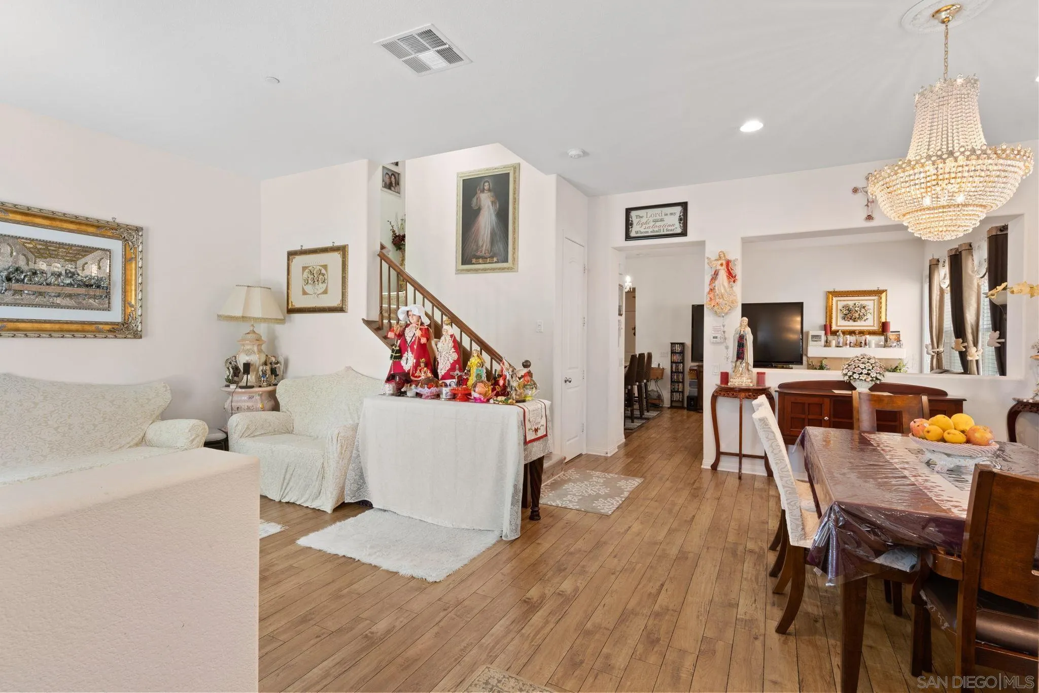 1438 Pershing Road Chula Vista, CA 91913 - Photo 4 of 45 a living room with dining room and wooden floor