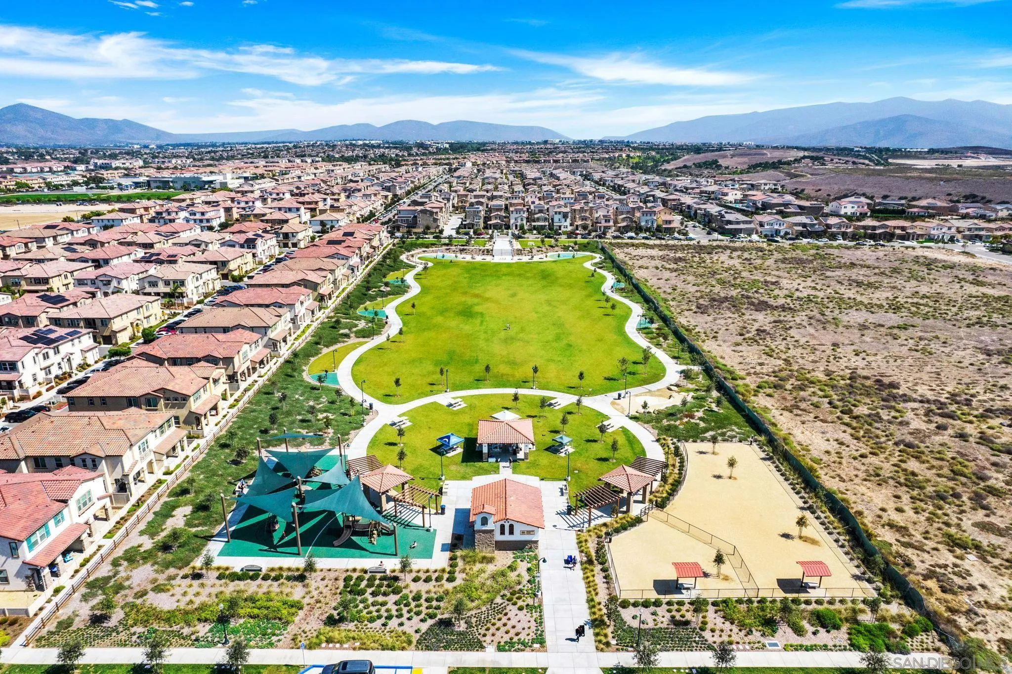 1438 Pershing Road Chula Vista, CA 91913 - Photo 43 of 45 an aerial view of residential building with swimming pool and ocean view