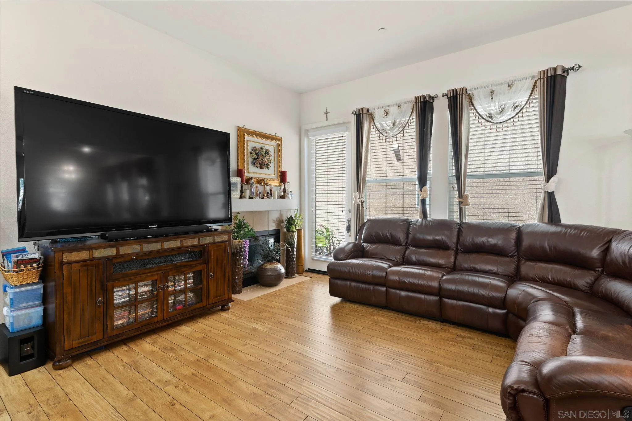1438 Pershing Road Chula Vista, CA 91913 - Photo 5 of 45 a living room with furniture and a flat screen tv