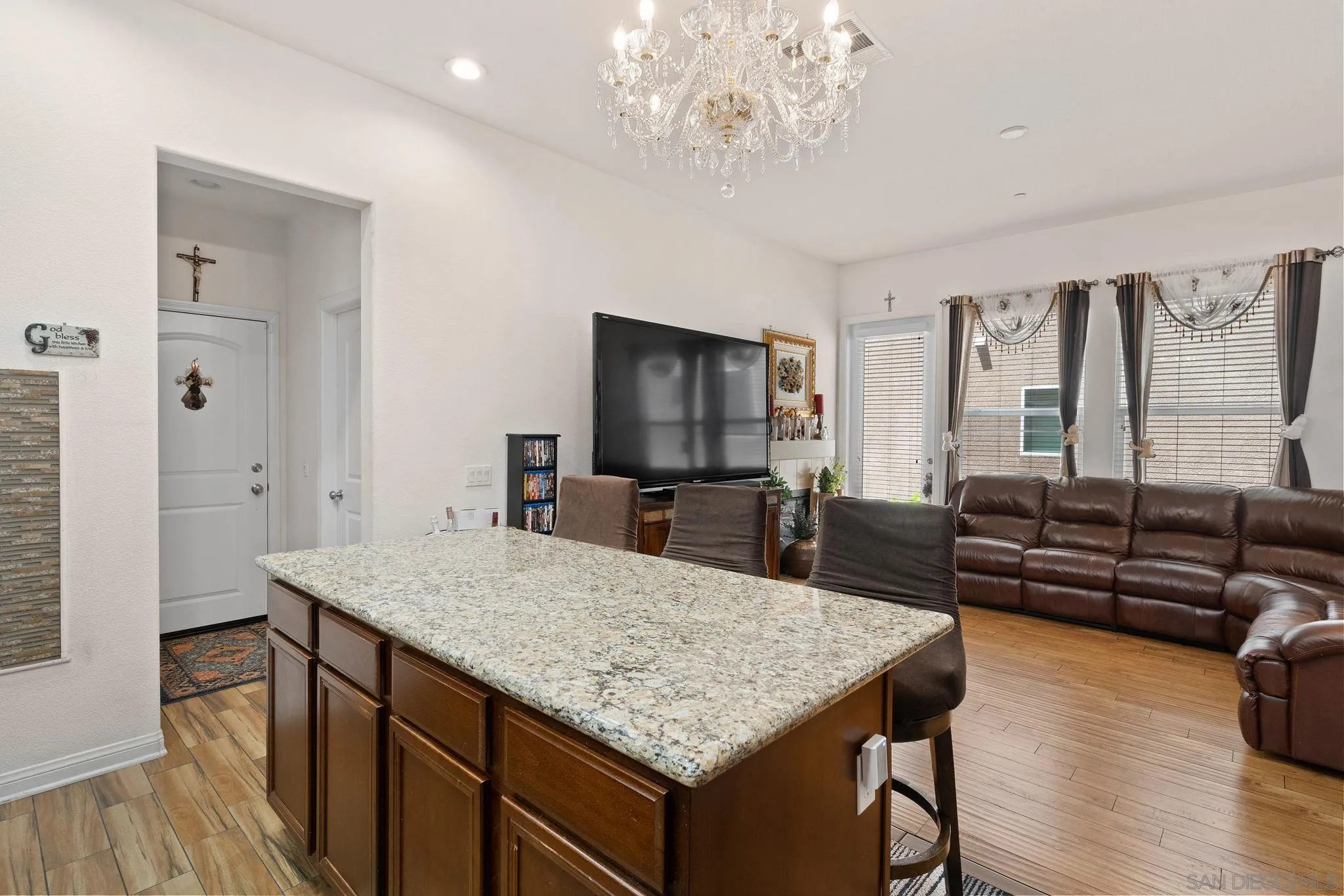 1438 Pershing Road Chula Vista, CA 91913 - Photo 10 of 45 a living room with furniture and a flat screen tv