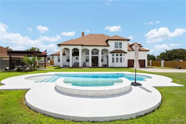 a view of a house with a swimming pool