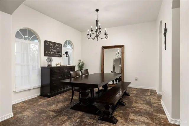 a view of a workspace with furniture