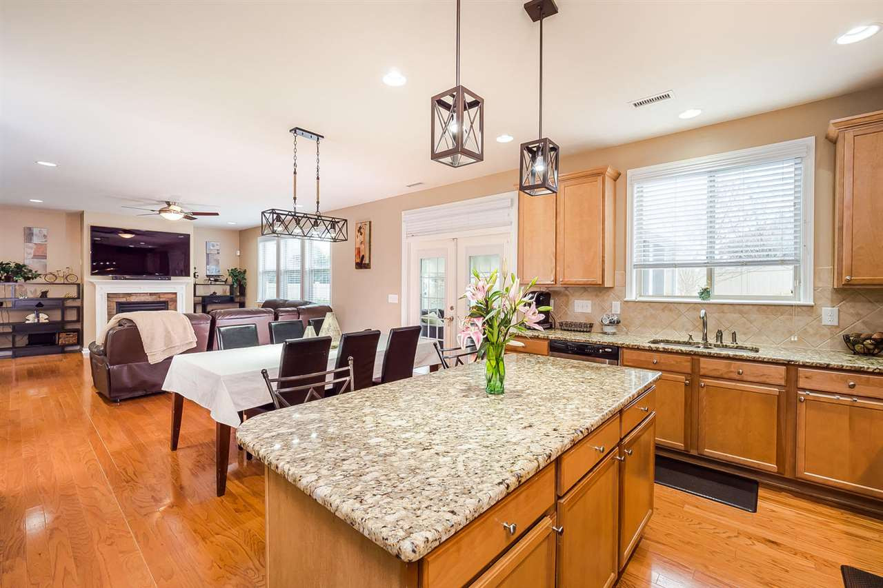 517 Front Ridge Drive Cary, NC 27519 - Photo 10 of 25 Open Kitchen and Breakfast Area with New Light Fixtures Kitchen/Breakfast Area