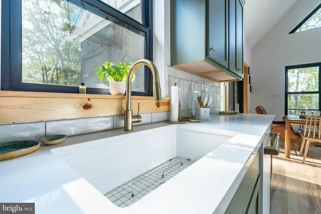 a bedroom with a bed and a mirror