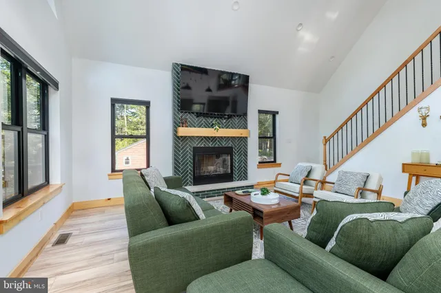 a bedroom with a bed and a desk