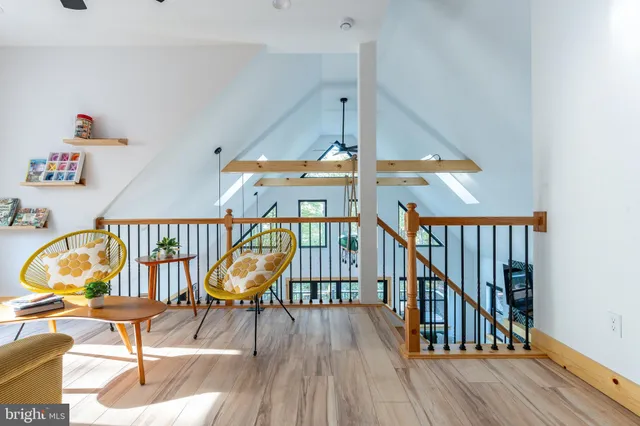 a view of a hallway with washer and dryer