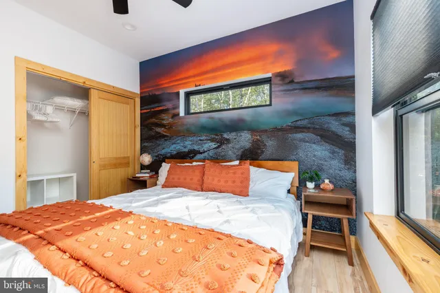 a front view of a house with yard and garage