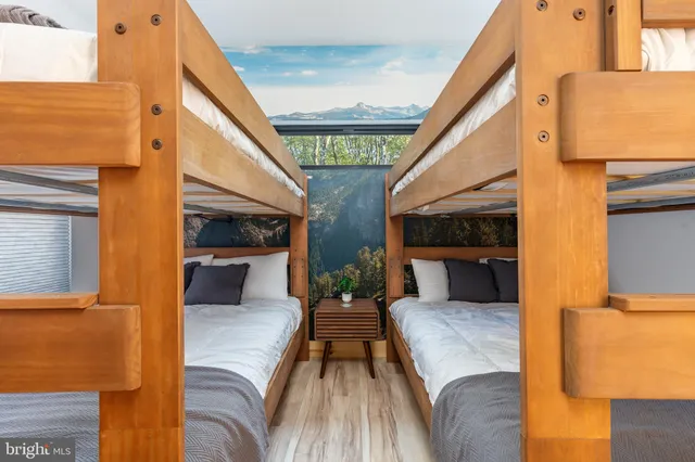 a view of a swimming pool with a deck